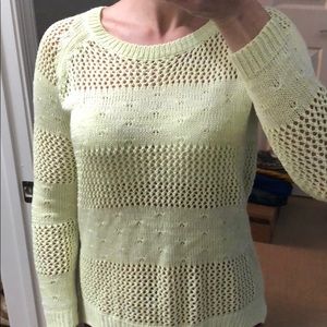 light green sweater